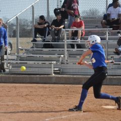 Lady Cats Bats Light Up the Night in First District Win