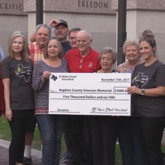 Main Street Uncorked Presents $5,000 to Veterans’ Memorial