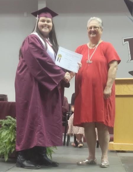 announces Mallory Wheat as the recipient of a $1,000.00 scholarship from the Hopkins County Genealogical Society
