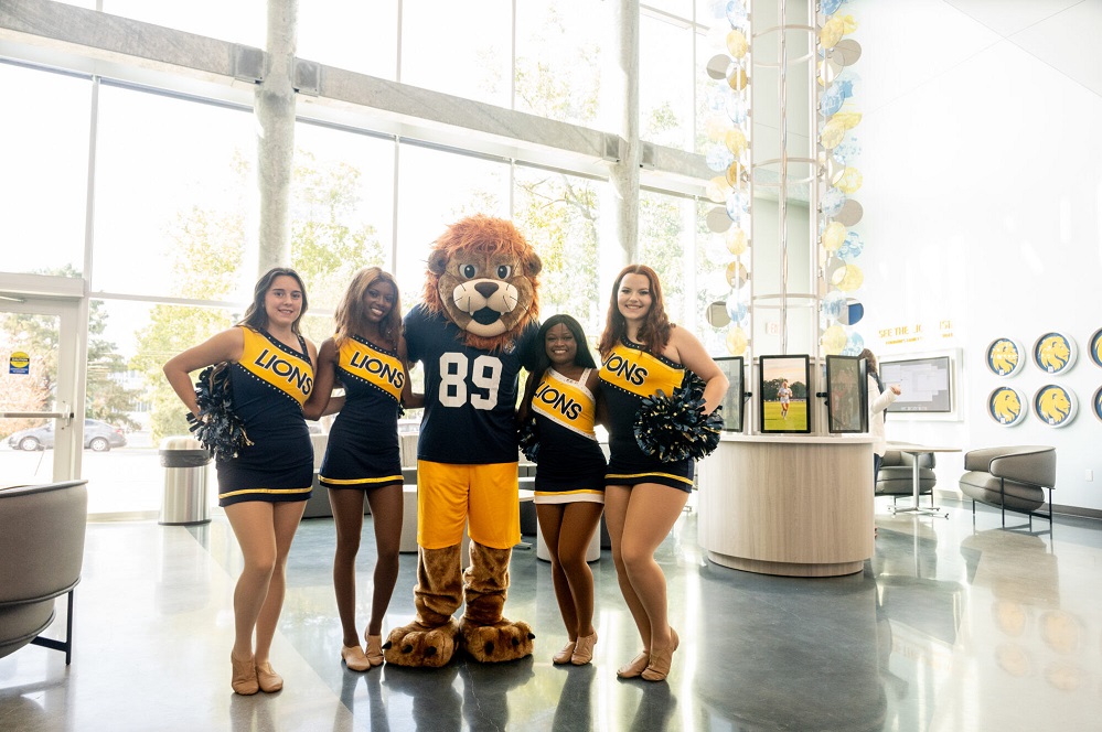 A&M-Commerce Cheerleaders and Lucky during the ribbon cutting in the new facility Photo by Paul Bryan A&M-Commerce Office of Marketing and Communications