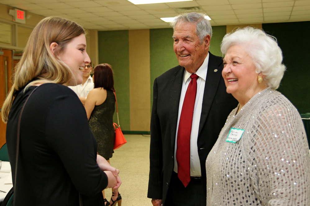 Gene and Ruth Ann Stallings are shown speaking with Anna Watson Stallings at a 2017 PJC event.