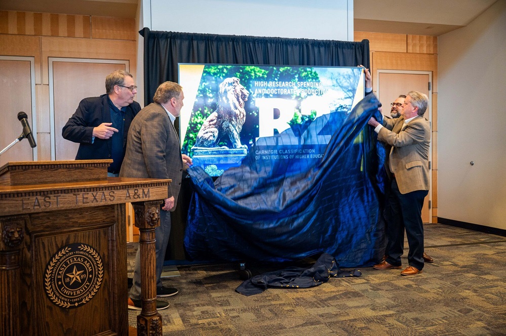 Representatives from The Texas A&M University System and East Texas A&M unveil the university’s new R2 designation | East Texas A&M Office of Marketing and Communications